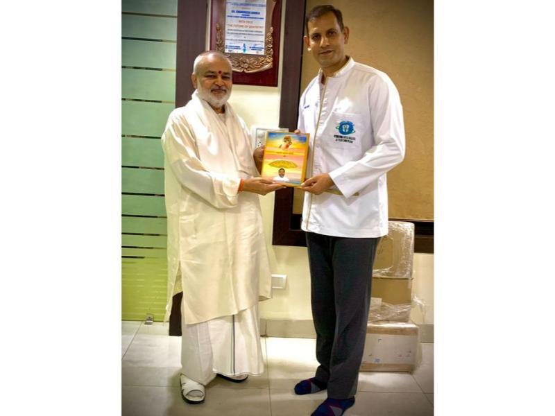 Brahamachari Girish Ji has  presented his book Param Pujya Maharishi Mahesh Yogi Ji ki Daiviya Chhatra Chhaya mein Brahmachari Girish to respected Dr. Chandresh Shukla Ji, MDS, PhD, reputed Senior Dental Surgeon of Bhopal and Member of  Dental Council of India. 